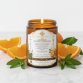 Bougie Patchouli Orange avec étiquette Rituel Élégance sur pot ambré